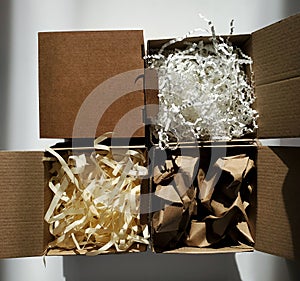 Cardboard boxes with fillers on a white background