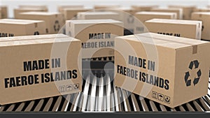 Cardboard boxes with Made in Faeroe Islands text on roller conveyor