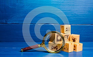 Cardboard boxes and magnifying glass. Monitoring and verification of goods, import certification. Quality control. Consumer market