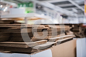 Cardboard boxes pieces in a pile at store