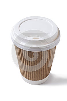 Cardboard cup with plastic white lid for hot drink on isolated white background. Mug for coffee or hot tea