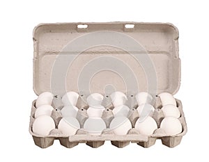 Cardboard egg box with white chicken eggs isolated on white