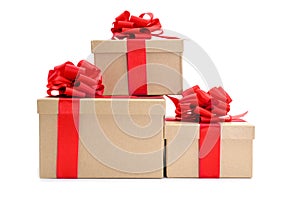 Cardboard gifts boxes with red ribbon bows