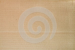 Cardboard sheet texture background, detail of recycle brown paper box pattern