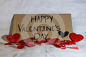 Cardboard sign Happy Valentine\'s Day isolated. Text of Happy Valentine\'s Day