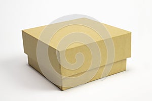 Cardboard square box isolated on white background as template for designers for logo, embossing, product etc. presentation