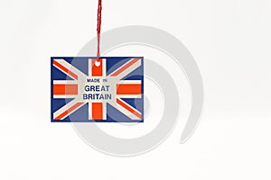 Cardboard tag on a string with a flag and the inscription made in great Britain photo