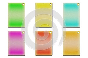 Cardboard tags in different colors on a white background