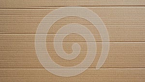 Cardboard texture, Paper box or packing paper, Brown horizontal corrugated and folded use for background, Close up.