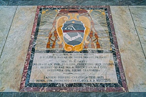 Cardinal coat of arms on the floor of the Church of Santa Maria in Portico in Campitelli in Rome, Italy.