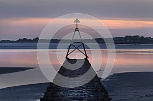 Cardinal marker on The Loughor Estuary