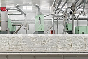 Carding machine in textile factory photo