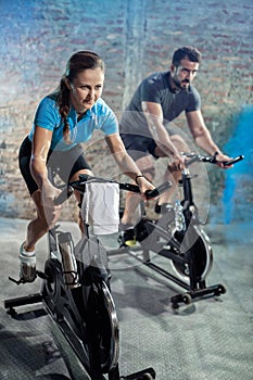 Cardio exercise class on bikes photo