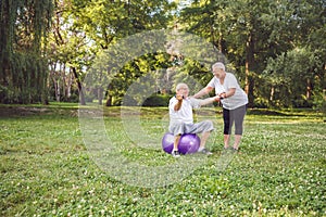 Cardio exercise for senior- Mature family couple exercising outdoors