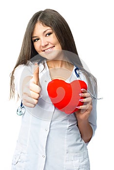 Cardiologist with a heart shaped pillow photo