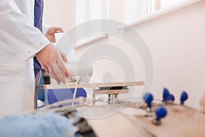 Cardiologist receiving a graphical recording of cardiac cycle