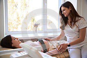 Cardiotocography for pregnant woman checking frequency of fetal heartbeat