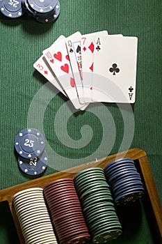 Cards with poker hand with chips