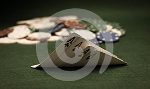 Cards and stack of poker chips