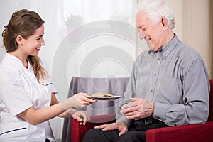 Care assistant and retired man