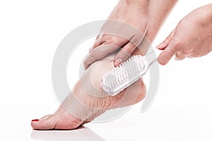 Care for dry skin on the well-groomed feet and heels with the he