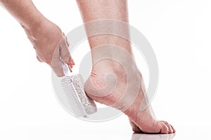 Care for dry skin on the well-groomed feet and heels with the he