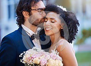 Care, kiss and couple at wedding happy with romantic outdoor marriage event celebration with flowers. Partnership