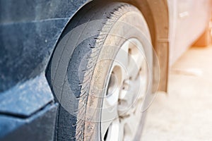 Care use unsafe tire, Change time for a front wheel rubber worn, bald, black, old and low tread car tires. Driving on worn tires