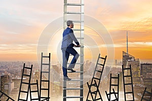 The career concept with businessman climbing ladder