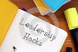 Career concept about Leadership Hacks with sign on the page