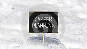 Career planning symbol. Concept words Career planning on beautiful black chalk blackboard. Beautiful white snow background. White