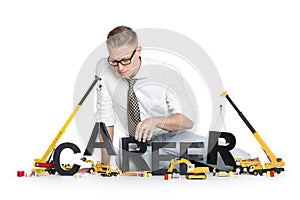 Career start up: Businessman building career-word.