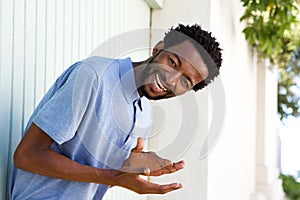 Carefree african american man laughing outside photo