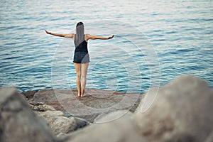 Carefree calm woman meditating in nature.Finding inner peace.Yoga practice.Spiritual healing lifestyle.Enjoying peace,anti-stress photo