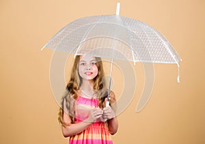 Carefree childhood. rainy weather. Fall mood. autumn fashion. small girl with umbrella. autumn weather forecast. School