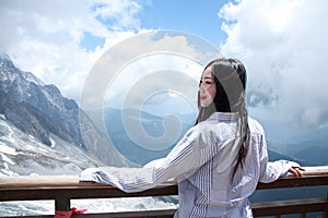 Carefree Chinese beauty on Yunnan Jade dragon snow mountain