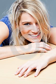 Carefree fun woman with a tousled hairstyle