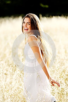 Carefree girl in field photo