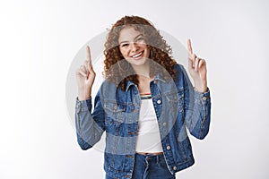 Carefree happy charming smiling european redhead girl freckles post-acne skin laughing joyfully raise hands pointing