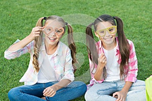 Carefree kids photo booth props funny eyewear outdoors, simple happiness concept