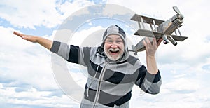 carefree senior retired man. mature man at retirement. old man on sky background with toy plane