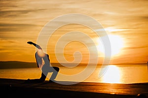 Carefree woman meditating in nature.Finding inner peace.Yoga practice.Spiritual healing lifestyle.Enjoying peace,anti-stress