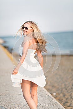 Carefree woman on a summer beach