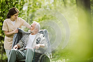 Careful caregiver taking care of the patient photo