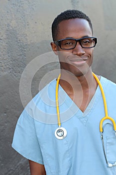 Caregiver isolated wearing scrubs and stethoscope