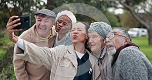 Caregiver, old people and selfie, funny face outdoor with elderly care and wellness, health and fresh air. Kiss