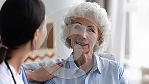 Caregiver visit consult positive senior woman patient