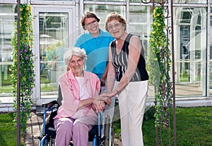 Caregivers for Elderly Patient at Home Garden.