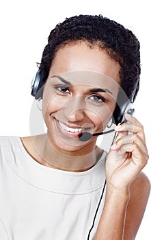 She cares about her customers. Studio portrait of a friendly female customer service representative wearing a headset.