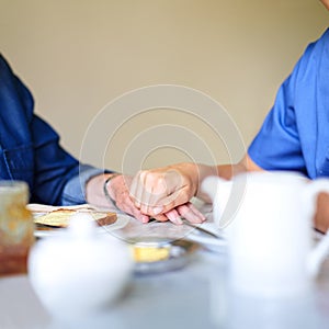 She really cares for her patients. a resident and a nurse at a retirement home.